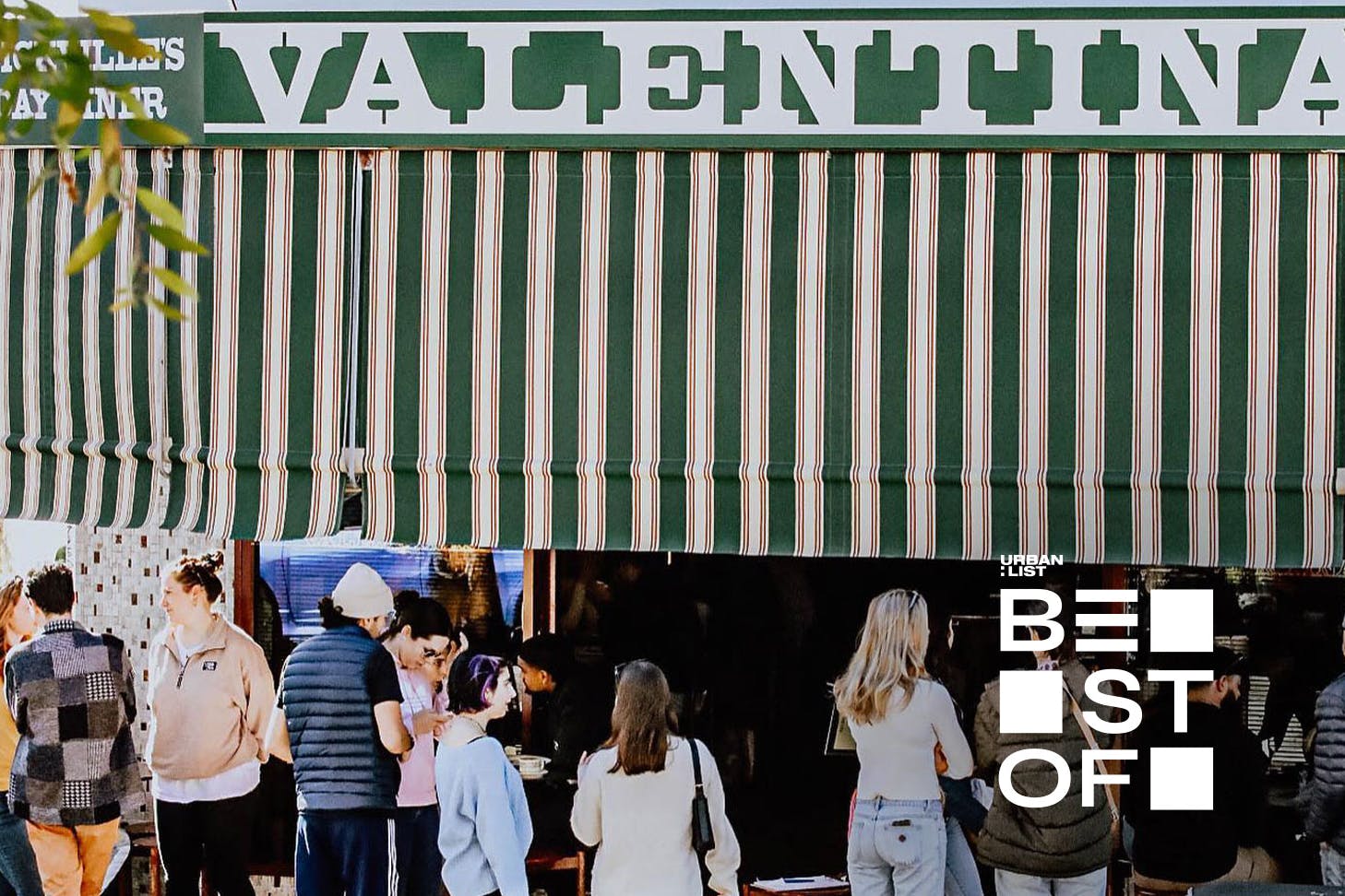 People outside Valentina's Cafe, which is near a playground in Marrickville